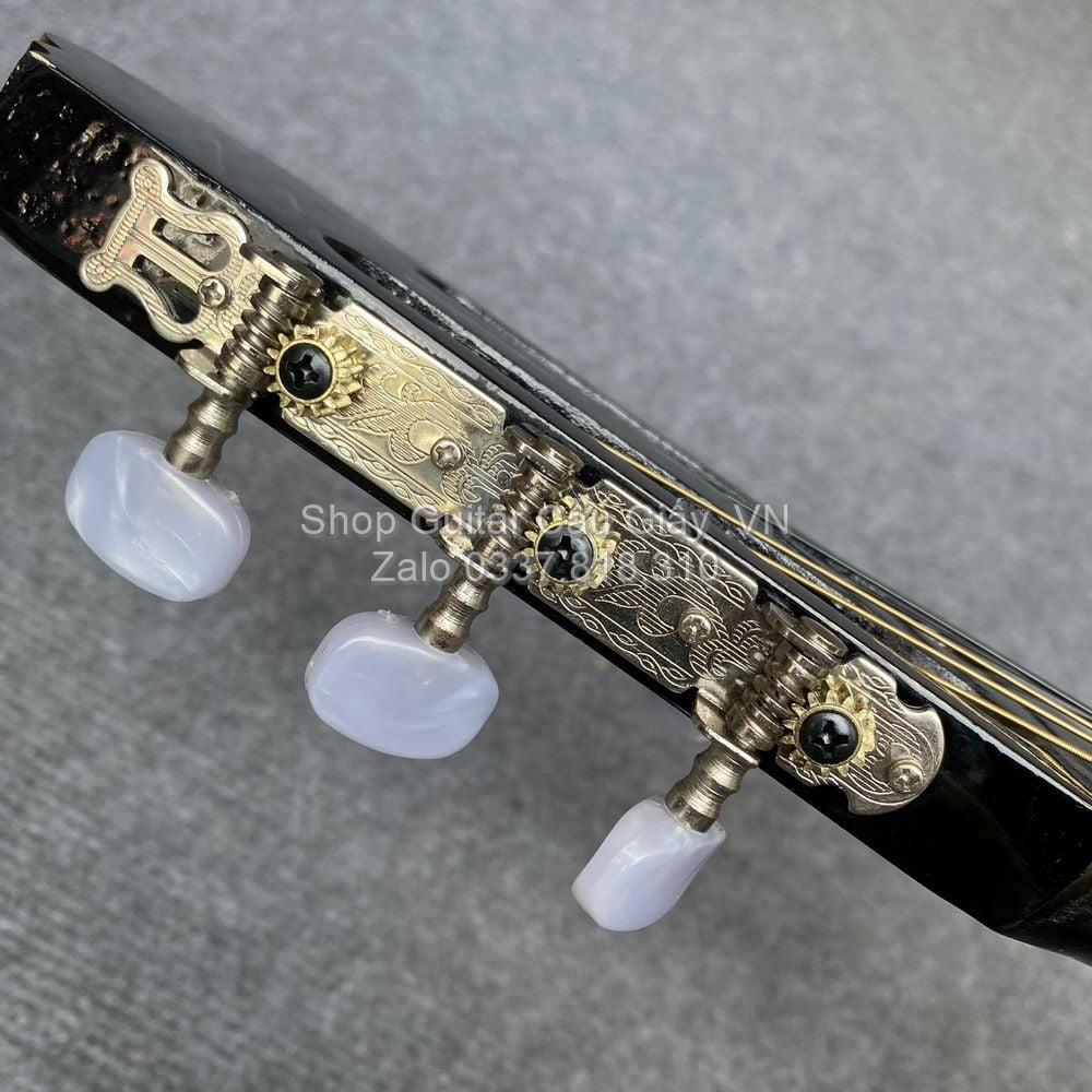 02 06 Dan Guitar Mini Tia Chop Viet DAM150 VB wm