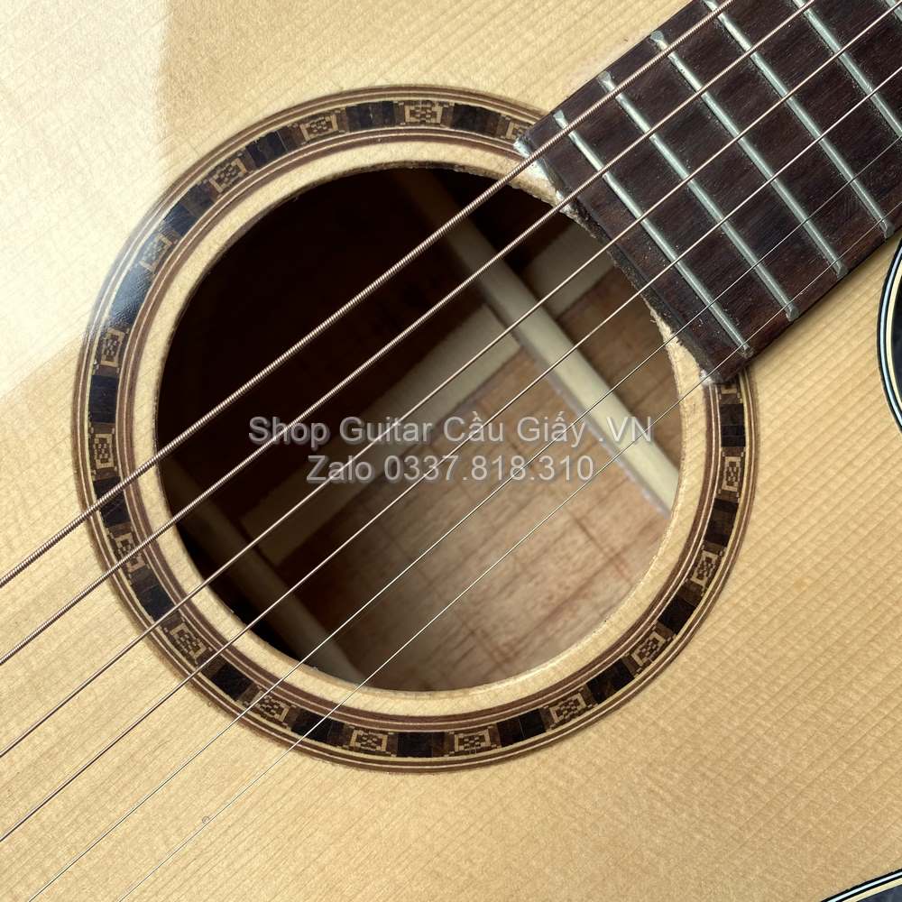 07 03 Dan Guitar Acoustic Tia Chop Viet J150 V wm