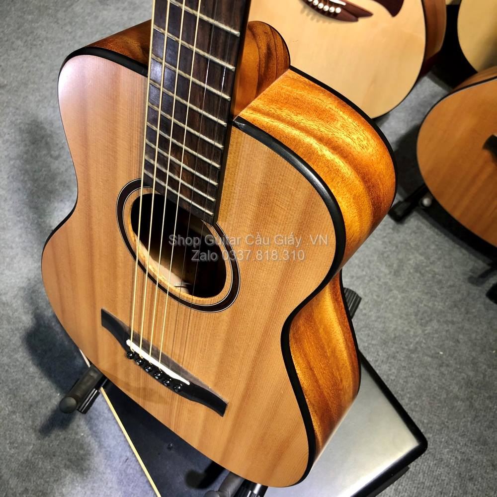 23 04 Thuan Guitar Mini 2 4 DT03 TIN wm