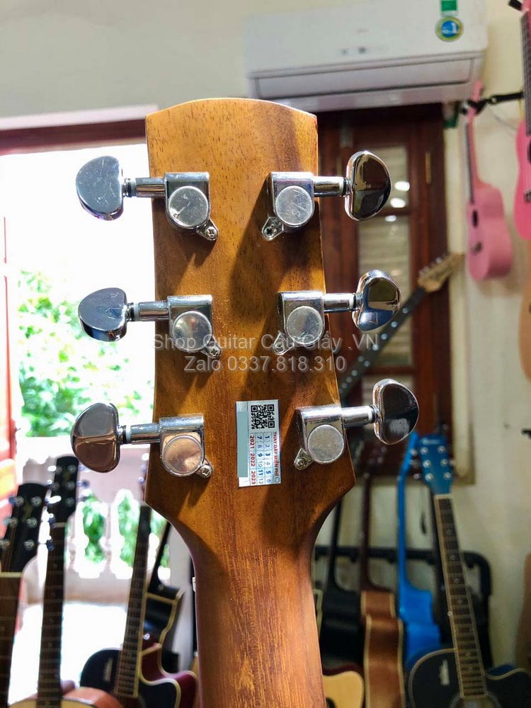 23 11 Thuan Guitar Mini 2 4 DT03 TIN wm