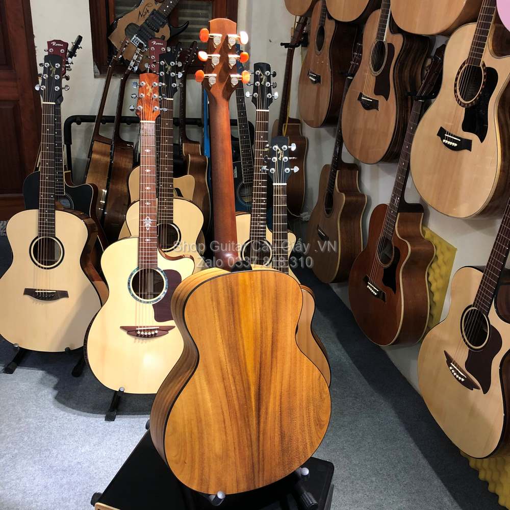 26 07 Thuan Guitar Mini 3 4 PS AT 03 TIN wm
