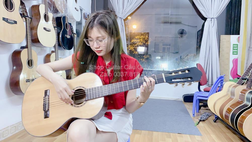 model 01 02 Dan Guitar Mini Tia Chop Viet DAM150 VN wm