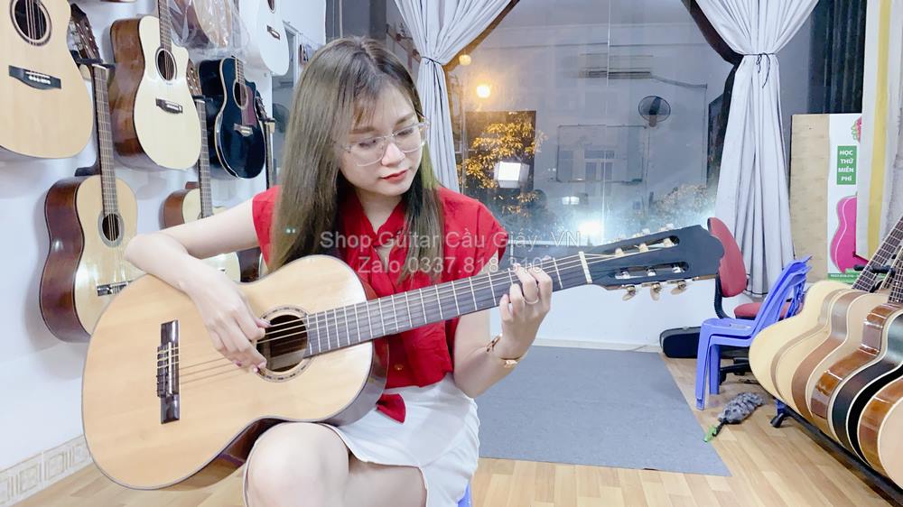 model 01 03 Dan Guitar Mini Tia Chop Viet DAM150 VN wm