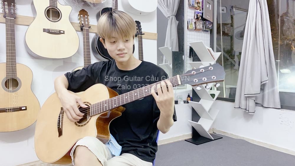 model 07 03 Dan Guitar Acoustic Tia Chop Viet J150 V wm