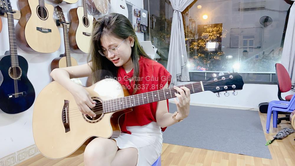 model 07 05 Dan Guitar Acoustic Tia Chop Viet J150 V wm