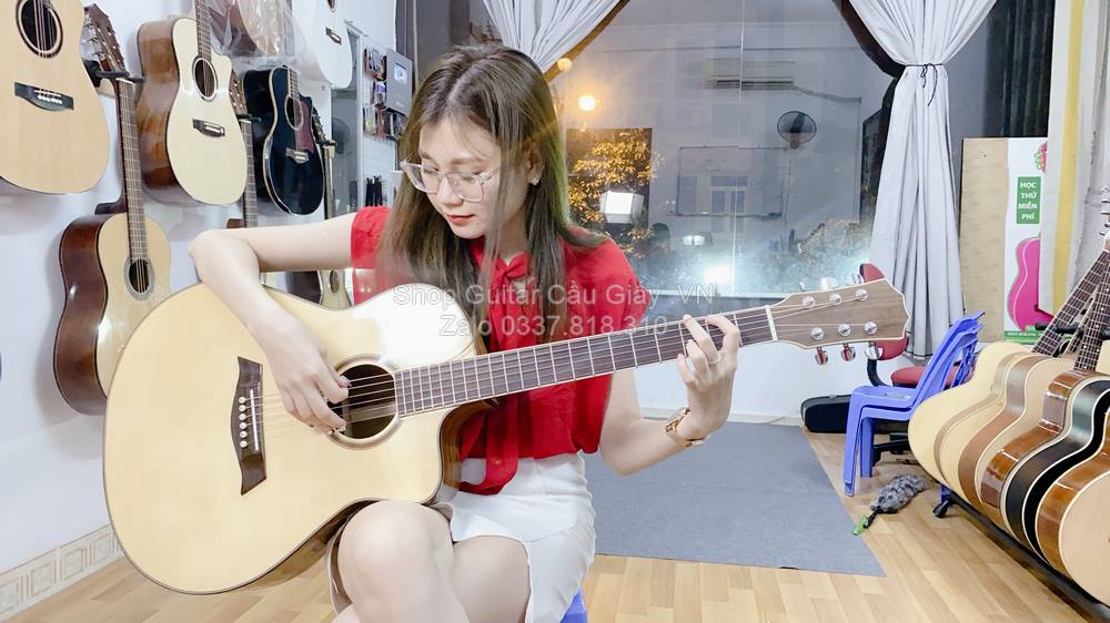 model 09 02 Dan Guitar Du Lich Tia Chop Viet J250 VM wm